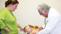 Doctor examining a child